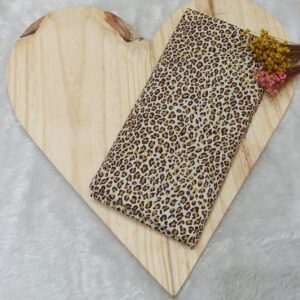 Tecido tricoline estampado onça fundo bege